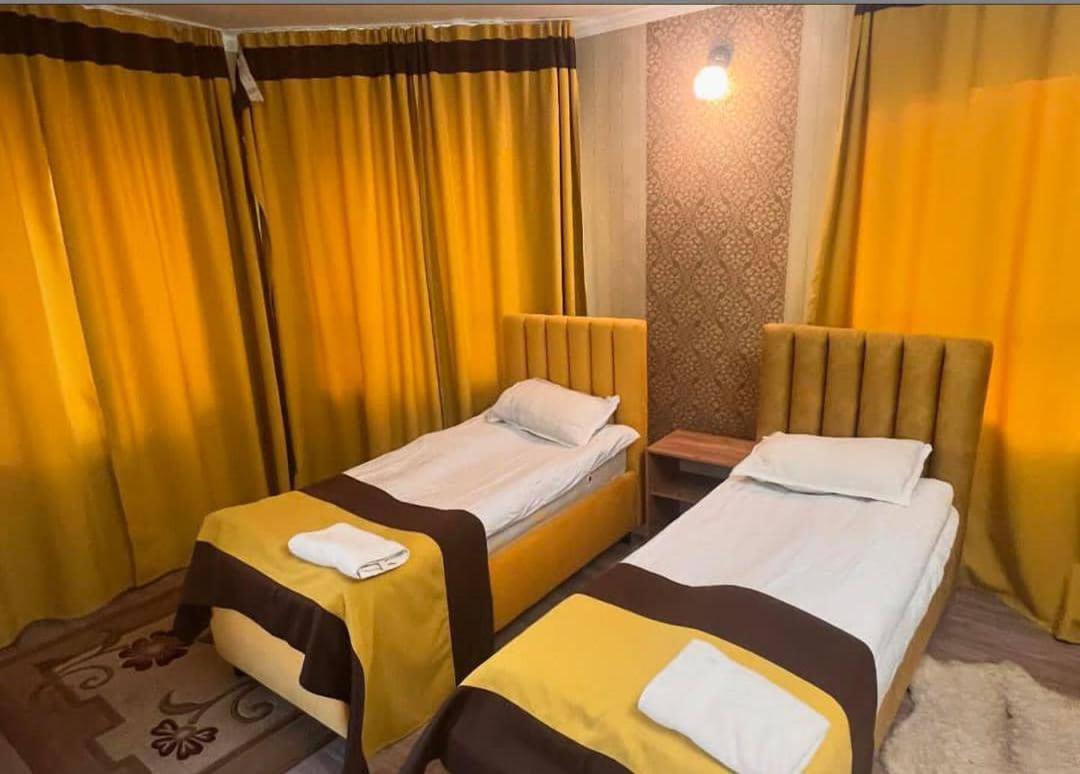 Turan Guesthouse Karakol Buitenkant foto